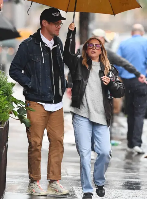 Ashley Tisdale and Christopher French Embrace the Rain on NYC Dinner Date 05-28-25