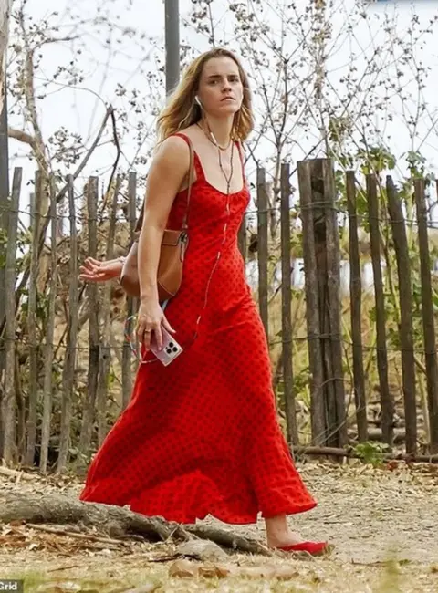 Emma Watson Stuns in Red Dress in Saint Tropez 08-28-2025